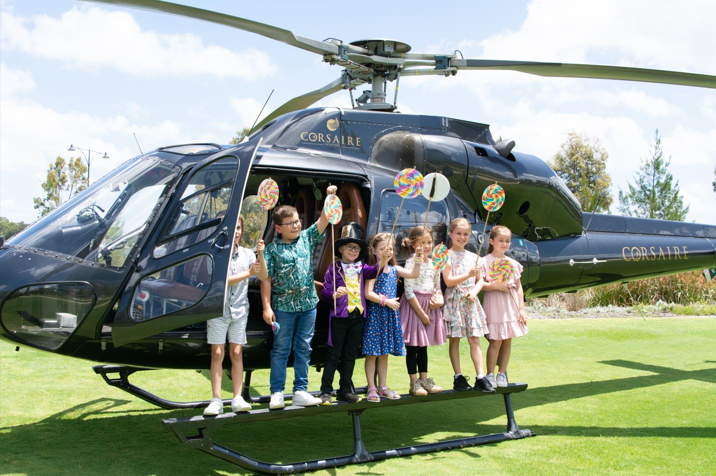 Photo of kids and helictoper 