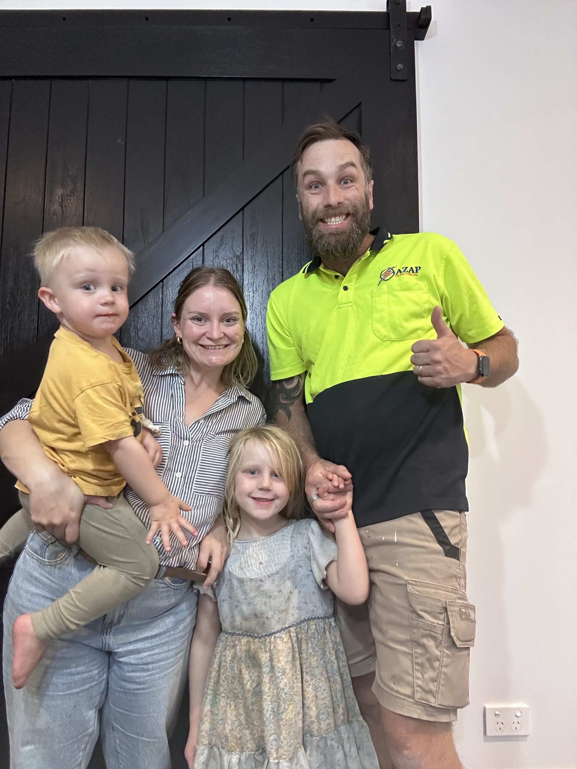 family photo of mum, dad, daughter and son